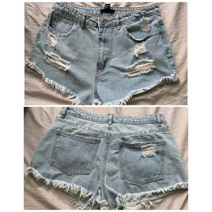 High waisted studded destroyed style denim shorts